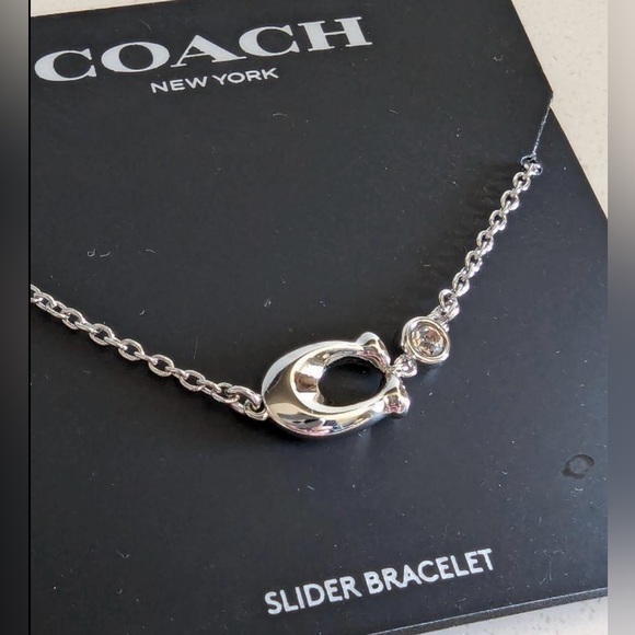 COACH Chubby C Logo Crystal Charm Signature Women’s Slider Bracelet Silver Tone - Picture 2 of 2